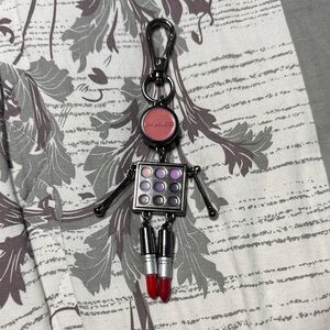 MAC Cosmetics Keychain with Red and Purple Accents
